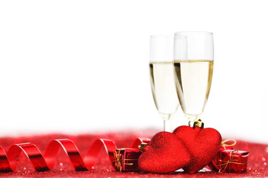 Two glasses of champagne with red decor, Valentines day concept