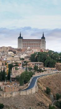 Mesmerizing shot of a beautiful cityscape and ancient castle of Toledo in Spain