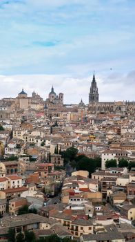 Mesmerizing shot of a beautiful cityscape and ancient Cathedral of Toledo in Spain