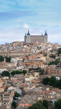 Mesmerizing shot of a beautiful cityscape and ancient castle of Toledo in Spain
