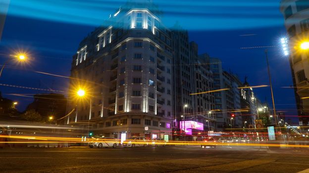 Madrid, Spain - 18 - September - 2020: Light trails during night in Plaza de Espana