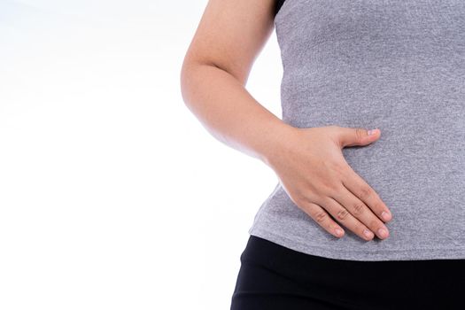 Woman hand touching stomach, waist, or liver position isolated white background. Health care and medical concept.