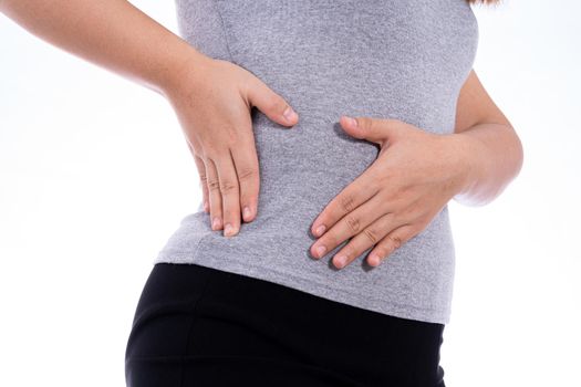 Woman hand touching stomach, waist, or liver position isolated white background. Health care and medical concept.