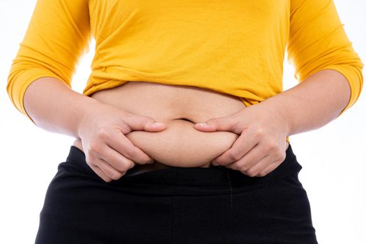 Fat woman holding excessive fat belly, overweight fatty belly isolated white background. Diet lifestyle, weight loss, stomach muscle, healthy concept.