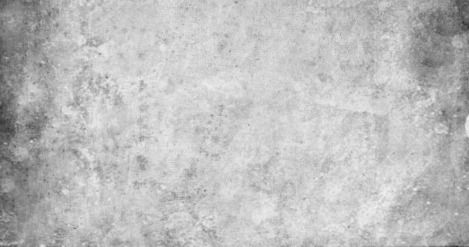 Grunge texture of gray paper with scratches and spots on the surface