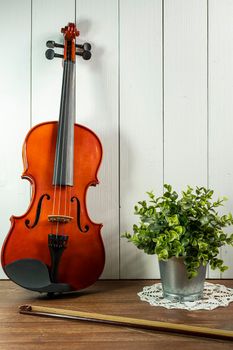 a violin on wooden table