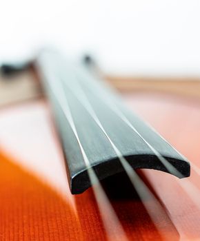 a violin on wooden table