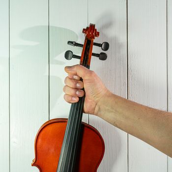 a violin in the hand