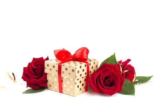 Valentine day gift box with red silk ribbon bow rose flowers isolated on white background love concept