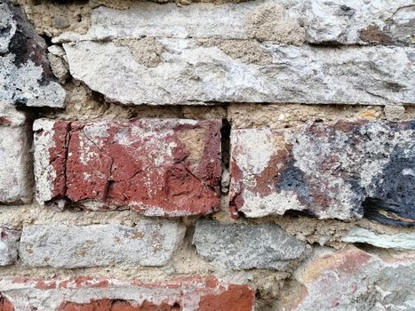 Close up of colorful old stone wall, texture background