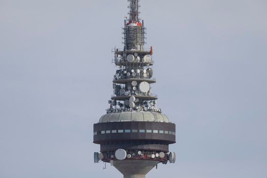 Madrid, Spain - January 10, 2021: Torrespaña, better known as Piruli, a huge television antenna, with a little snow after the storm, due to the Filomena polar cold front.