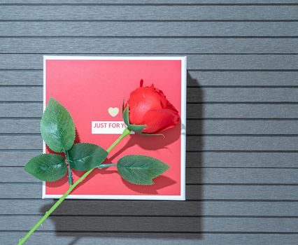 Top view  Valentine's Day concept with red roses and red box