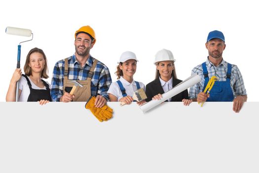 Group of industrial workers with blank banner. Isolated over white background.