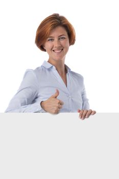 Beautiful redhead business woman holding blank sign isolated on white background