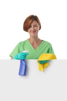 A woman cleaning lady with a rag in her hand holds an air freshener spray. House cleaning concept or office cleaning concept. Blank banner