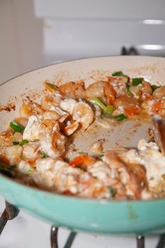 Cooking shrimp with cream cheese and green onions