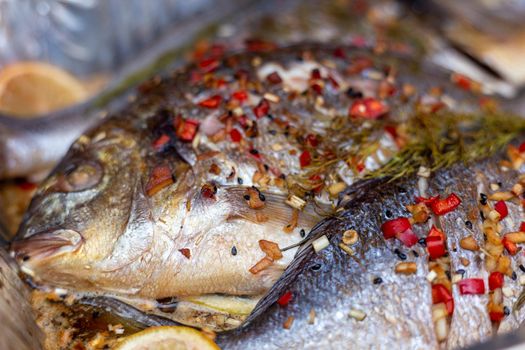 Smoked sea bream with peppers and herbs zoom in head