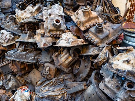 The remains of machinery equipment from cars that were placed on top of each other