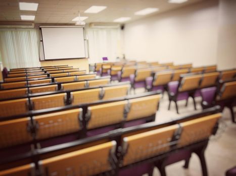 Empty classroom, college lecture hall  preparing for education in university, conference room before meeting. Business meeting room or Board room interiors. vintage tone.