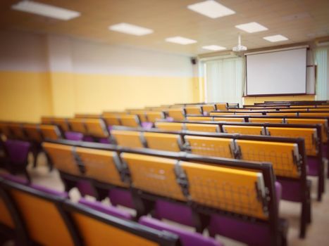 Empty classroom, college lecture hall  preparing for education in university, conference room before meeting. Business meeting room or Board room interiors. vintage tone.
