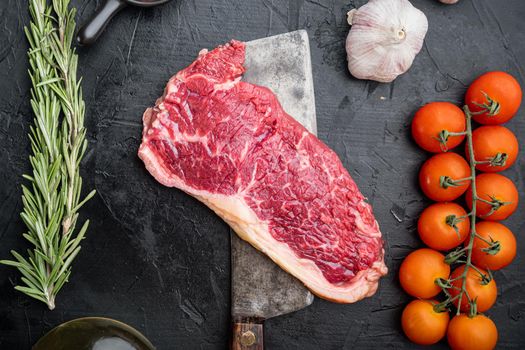 Top loin, fresh organic beef meat cut, on black background, top view