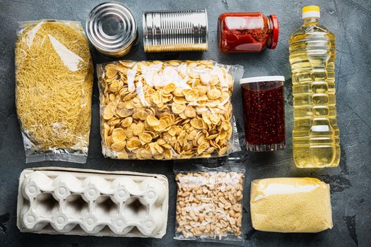 Food donations or delivery, top view, on grey background
