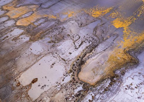 rusted cold rolled sheet metal - close-up abstract heavy industry and low tech background with selective focus