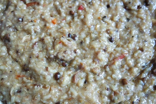 A close up view of Cooked white rice called Kichra served with green mint with traditional Charsadda recipe popular for its delicious taste in Pakistan