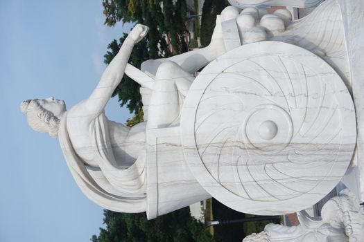 CHUNCHEON, SOUTH KOREA- October-03, 2020: White marble stone statue of sitting Poseidon or Neptune