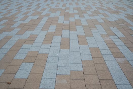 Closeup texture of brick floor. A background of a weathered old exterior brick floor with copy space for text