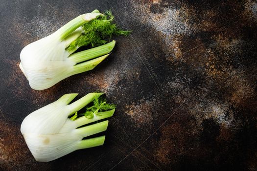 Fennel bulbs, on old rustic background, top view with space for text