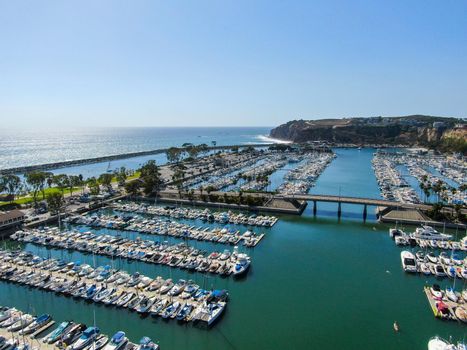 Aerial view of Dana Point Harbor and her marina with yacht and sailboat. southern Orange County, California. USA