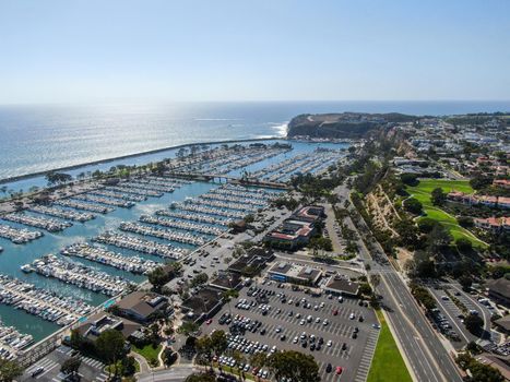 Aerial view of Dana Point Harbor town and beach. Southern Orange County, California. USA