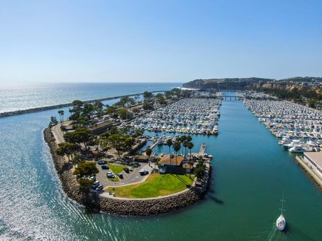 Aerial view of Dana Point Harbor and her marina with yacht and sailboat. southern Orange County, California. USA