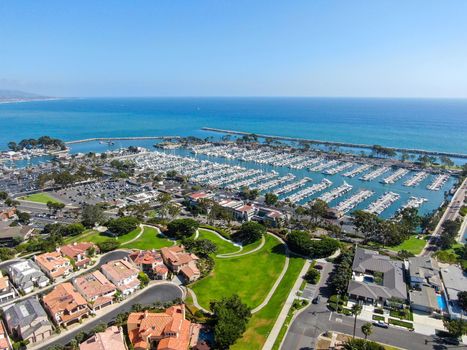 Aerial view of Dana Point Harbor town and beach. Southern Orange County, California. USA