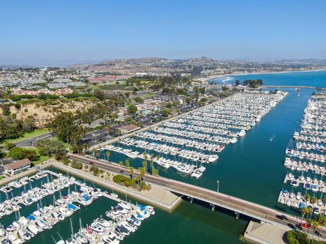 Aerial view of Dana Point Harbor and her marina with yacht and sailboat. southern Orange County, California. USA