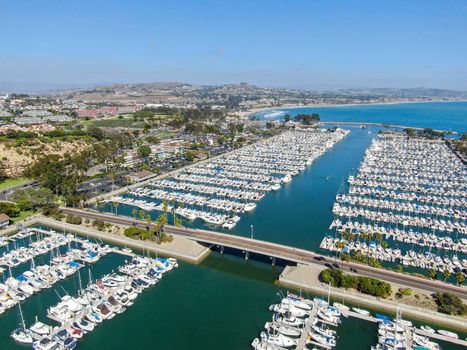 Aerial view of Dana Point Harbor and her marina with yacht and sailboat. southern Orange County, California. USA