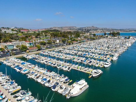 Aerial view of Dana Point Harbor and her marina with yacht and sailboat. southern Orange County, California. USA