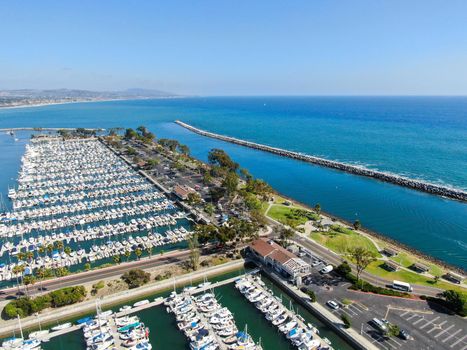 Aerial view of Dana Point Harbor and her marina with yacht and sailboat. southern Orange County, California. USA