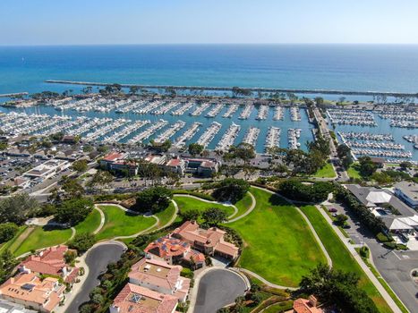 Aerial view of Dana Point Harbor town and beach. Southern Orange County, California. USA