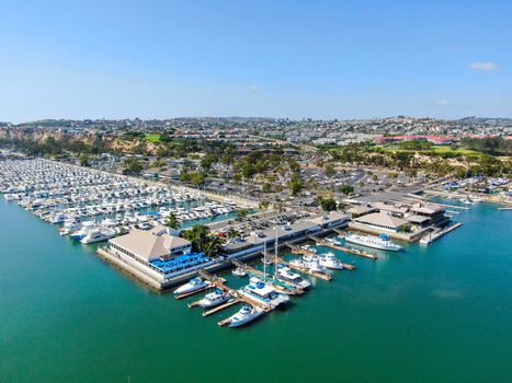 Aerial view of Dana Point Harbor and her marina with yacht and sailboat. southern Orange County, California. USA