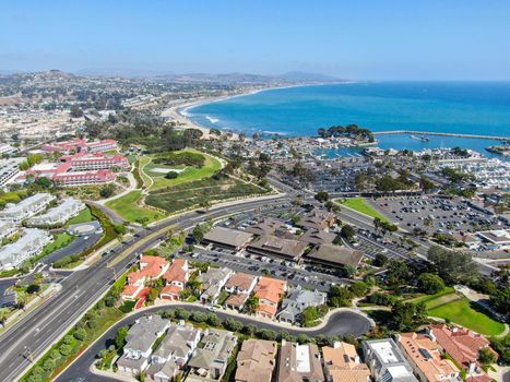 Aerial view of Dana Point Harbor town and beach. Southern Orange County, California. USA