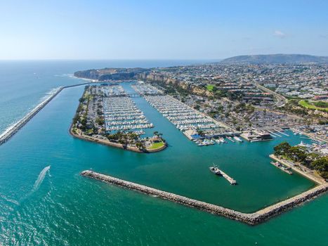 Aerial view of Dana Point Harbor town and beach. Southern Orange County, California. USA