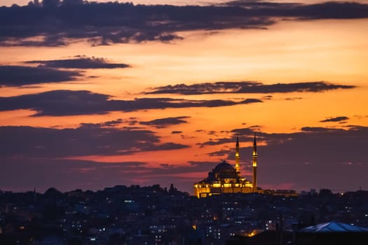 Istanbul sunset skyline panoramic view of Istanbul Turkey. Beautiful Bosphorus with mosques at the background.