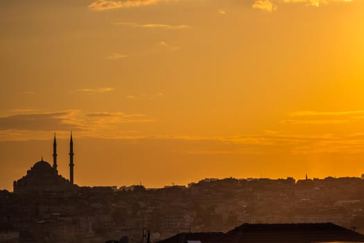 Istanbul sunset skyline panoramic view of Istanbul Turkey. Beautiful Bosphorus with mosques at the background.