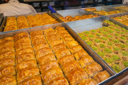 Sweets shop in Istanbul, traditional turkish desserts like baklava, turkish delight, cream brulee, rice puddings, cakes, teas, kunefe, knafeh desserts.