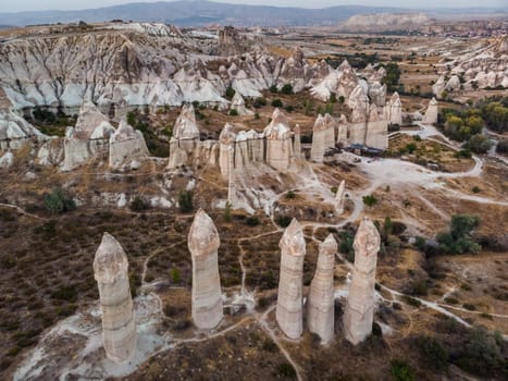 Aerial drone view of the fairy chimney landscape in Love Valley of Cappadocia in Goreme, Turkey.