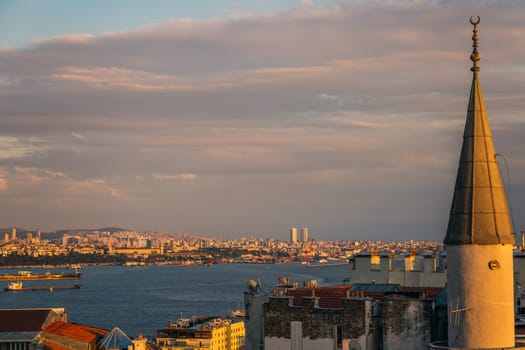 Istanbul sunset skyline panoramic view of Istanbul Turkey. Beautiful Bosphorus with mosques at the background.