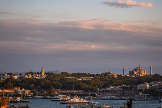 Istanbul sunset skyline panoramic view of Istanbul Turkey. Beautiful Bosphorus with mosques at the background.