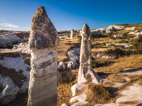 Aerial drone view of the fairy chimney landscape in Love Valley of Cappadocia in Goreme, Turkey.